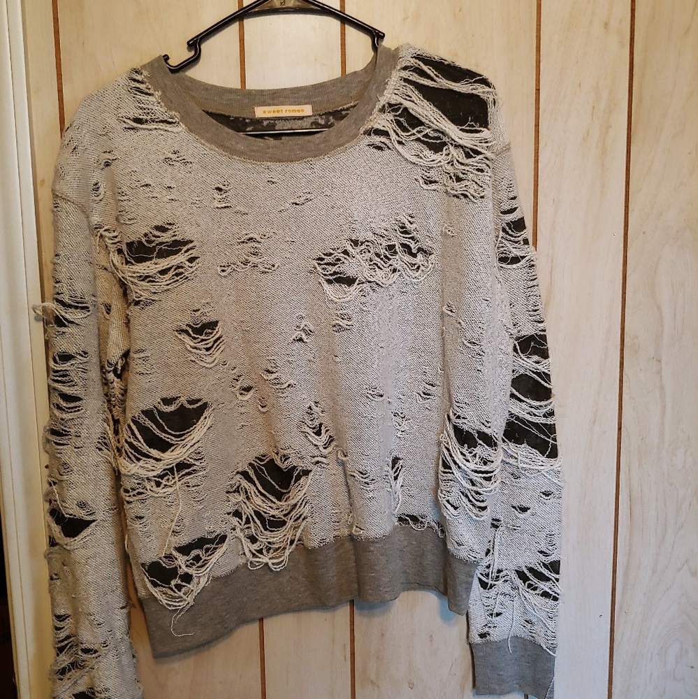 Tattered sweater